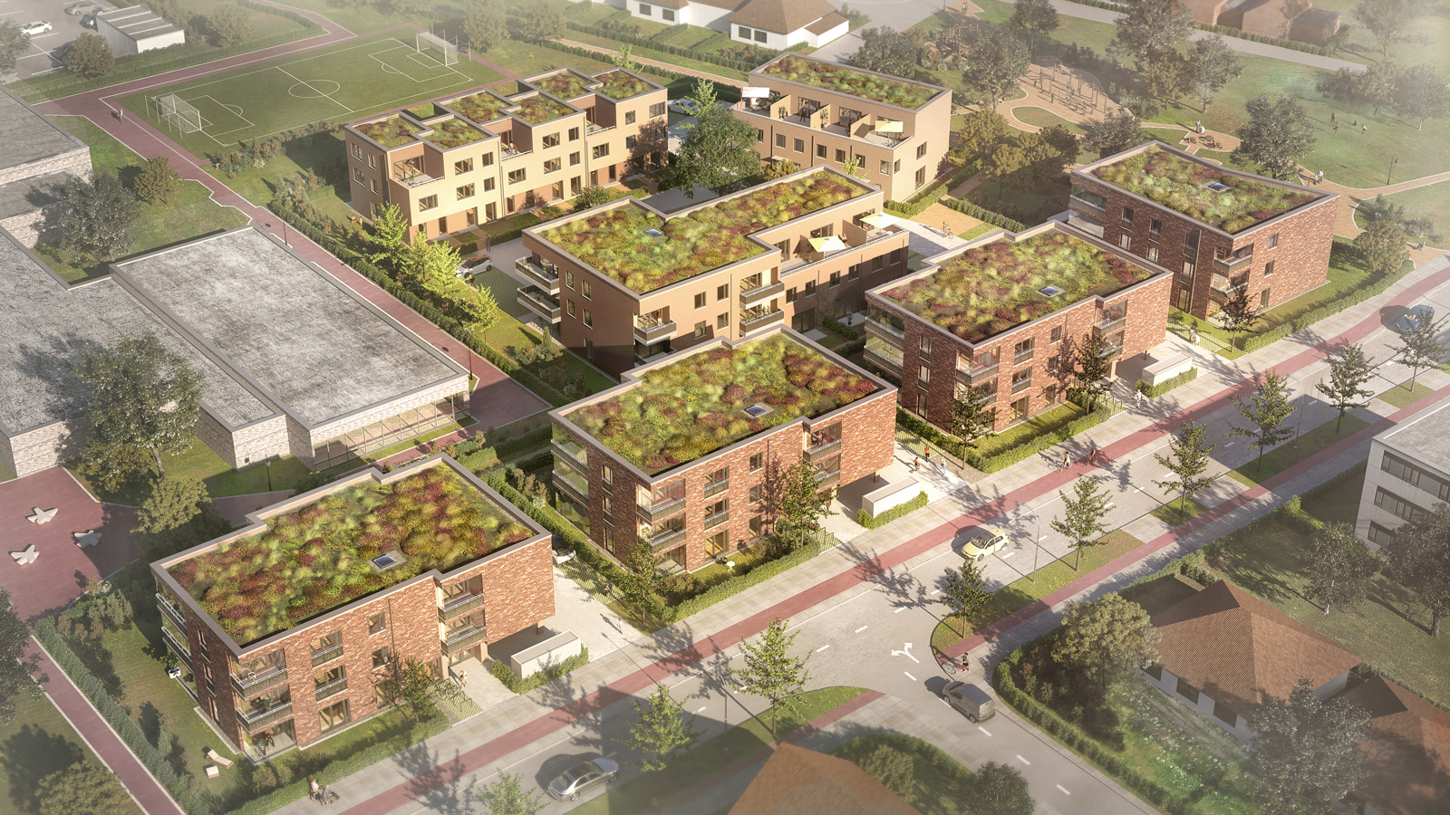 Luftbild des Vitalquartiers Hanover mit Aufsicht auf 7 Wohngebäude und einen Sportplatz